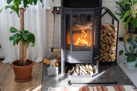 black-metal-steel-fireplace-stove-with-fire-and-fi-2024-11-01-15-17-25-utc.jpg